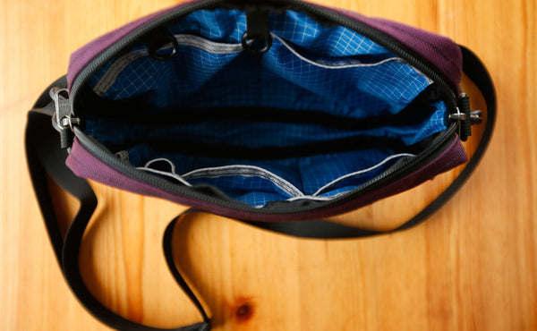 An above shot of the open main compartment of the Side Kick.